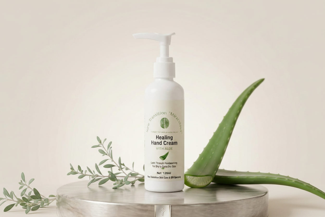 Healing Hand Cream bottle on a round wooden surface with a neutral background