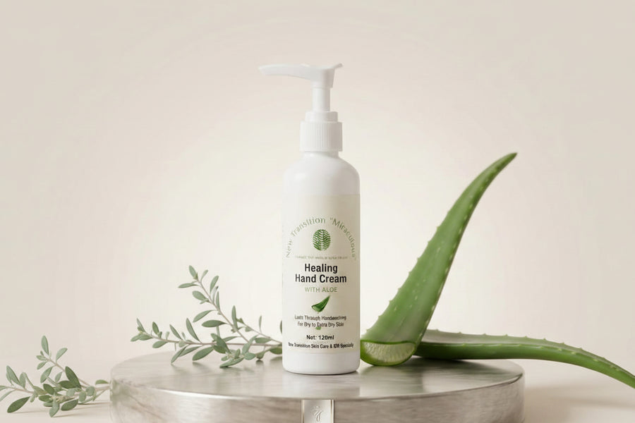 Healing Hand Cream bottle on a round wooden surface with a neutral background